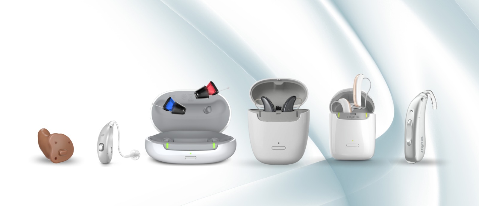 Middle-aged person using hearing aid for mild hearing loss correction